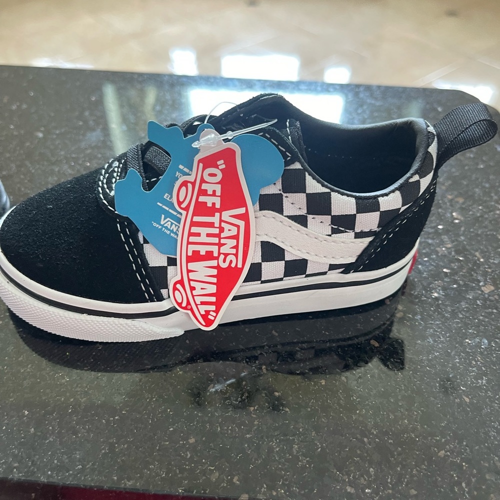 Toddler boy size 7 checkered slip on vans